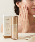 Applying Natures Beauty Ovine Placenta Essence to skin